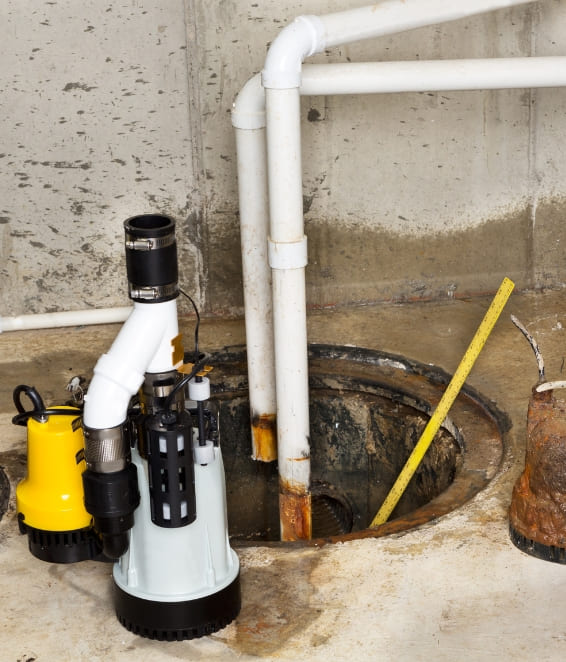 replacing old sump pump in a basement